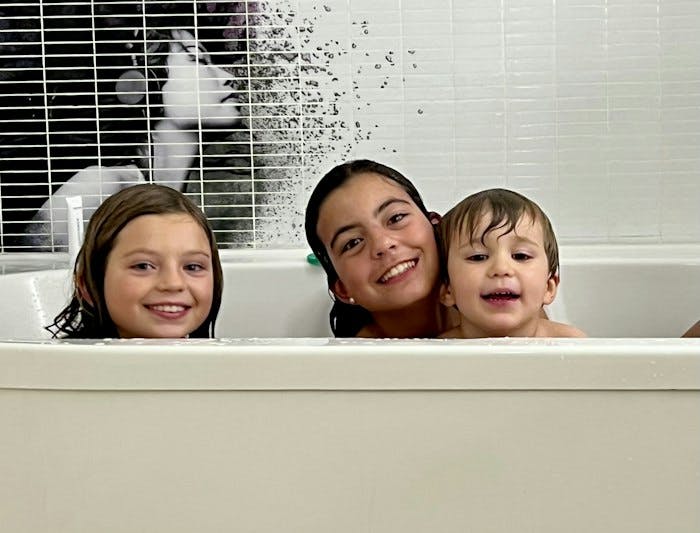 Img: bathing, bathtub, person, tub, face, head, hot tub