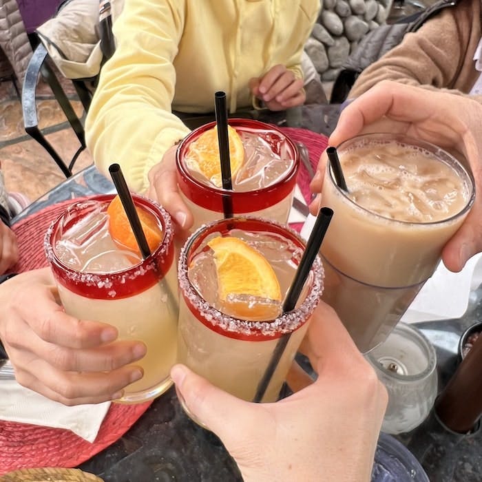 Img: beverage, juice, cocktail, adult, female, person, woman, brunch, smoothie, lemonade
