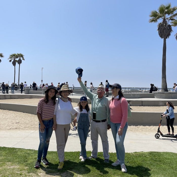 Img: pants, palm tree, tree, female, girl, person, teen, people, e-scooter, summer