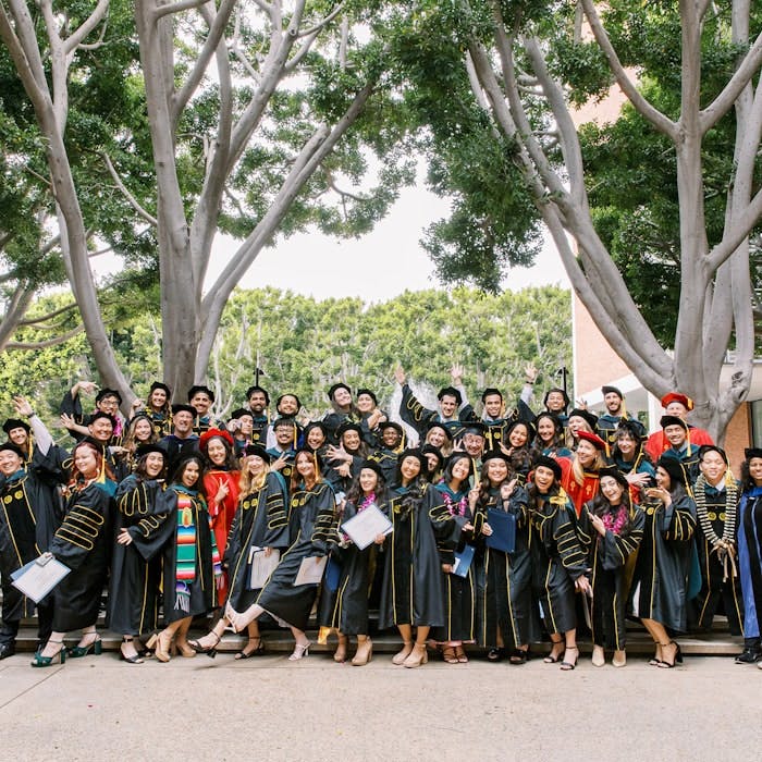 Img: architecture, building, college, clothing, footwear, high heel, shoe, person, people, groupshot