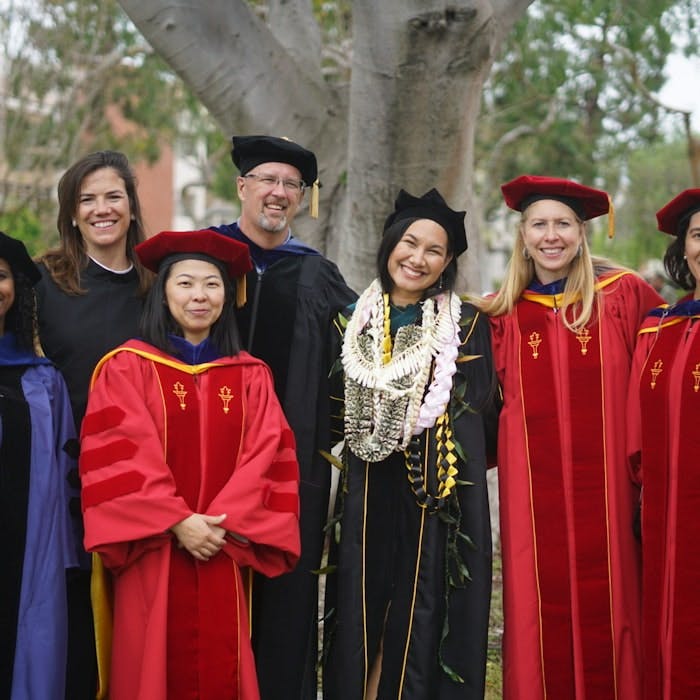 Img: people, person, adult, female, woman, graduation, groupshot, face, head