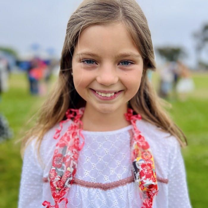 Img: face, head, person, smile, photography, portrait, flower arrangement, accessories, child, girl