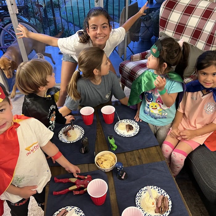 Img: people, person, icing, boy, child, male, dining table, female, girl, dining room