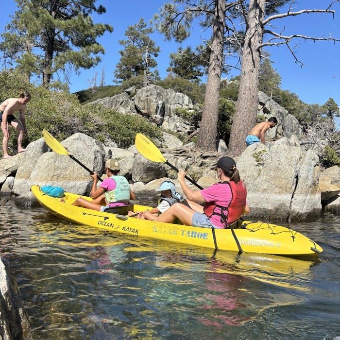 Img: rock, water, lifejacket, vest, person, boat, vehicle, kayak, rowboat, hat